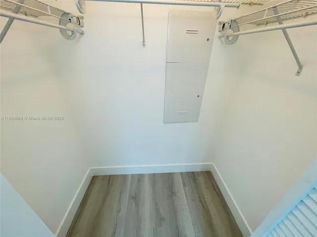 a view of a room with racks on the wall