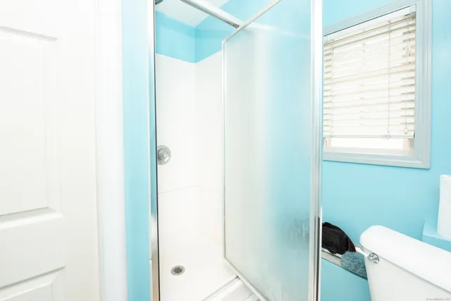 a view of house with backyard