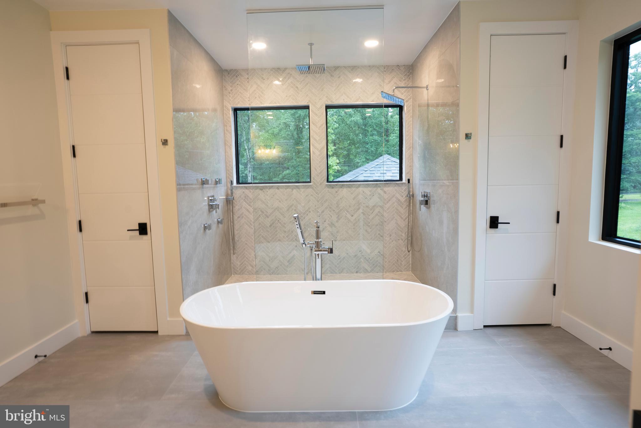 5947 Doyle Road Clifton, VA 20124 - Photo 48 of 69 a white bath tub sitting in a bathroom