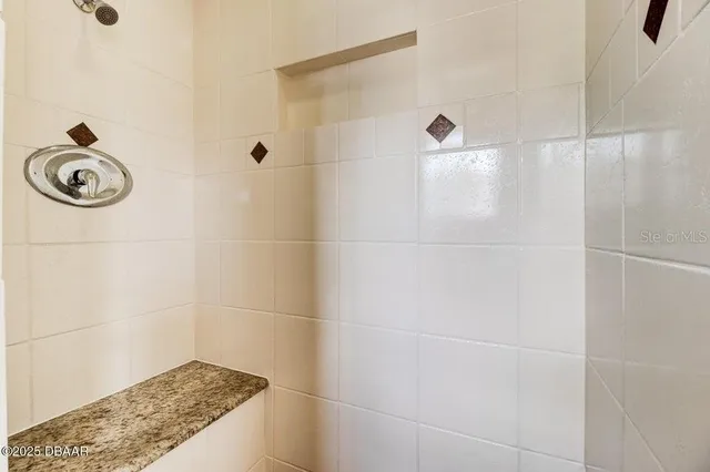 a bathroom with a toilet a sink and a mirror