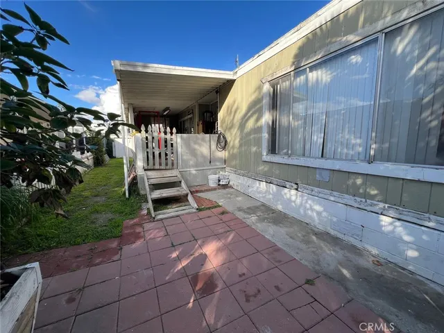 a view of a back yard of the house