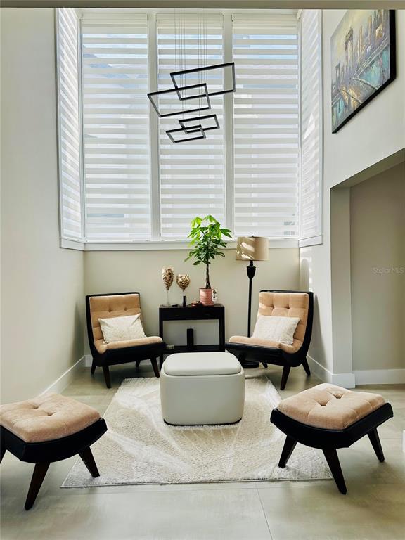 784 South Pennsylvania Avenue Winter Park, FL 32789 - Photo 7 of 29 a living room with furniture and a potted plant