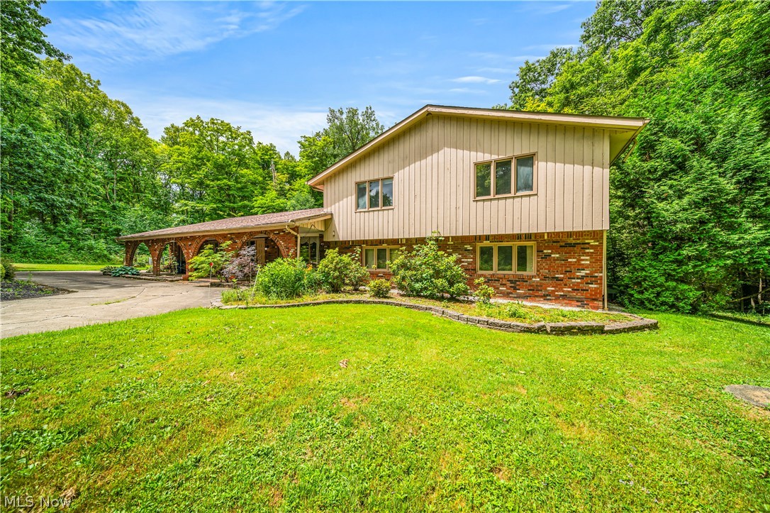 12200 Caves Road Chesterland, OH 44026 - Photo 2 of 43 Tri-level home with a front lawn