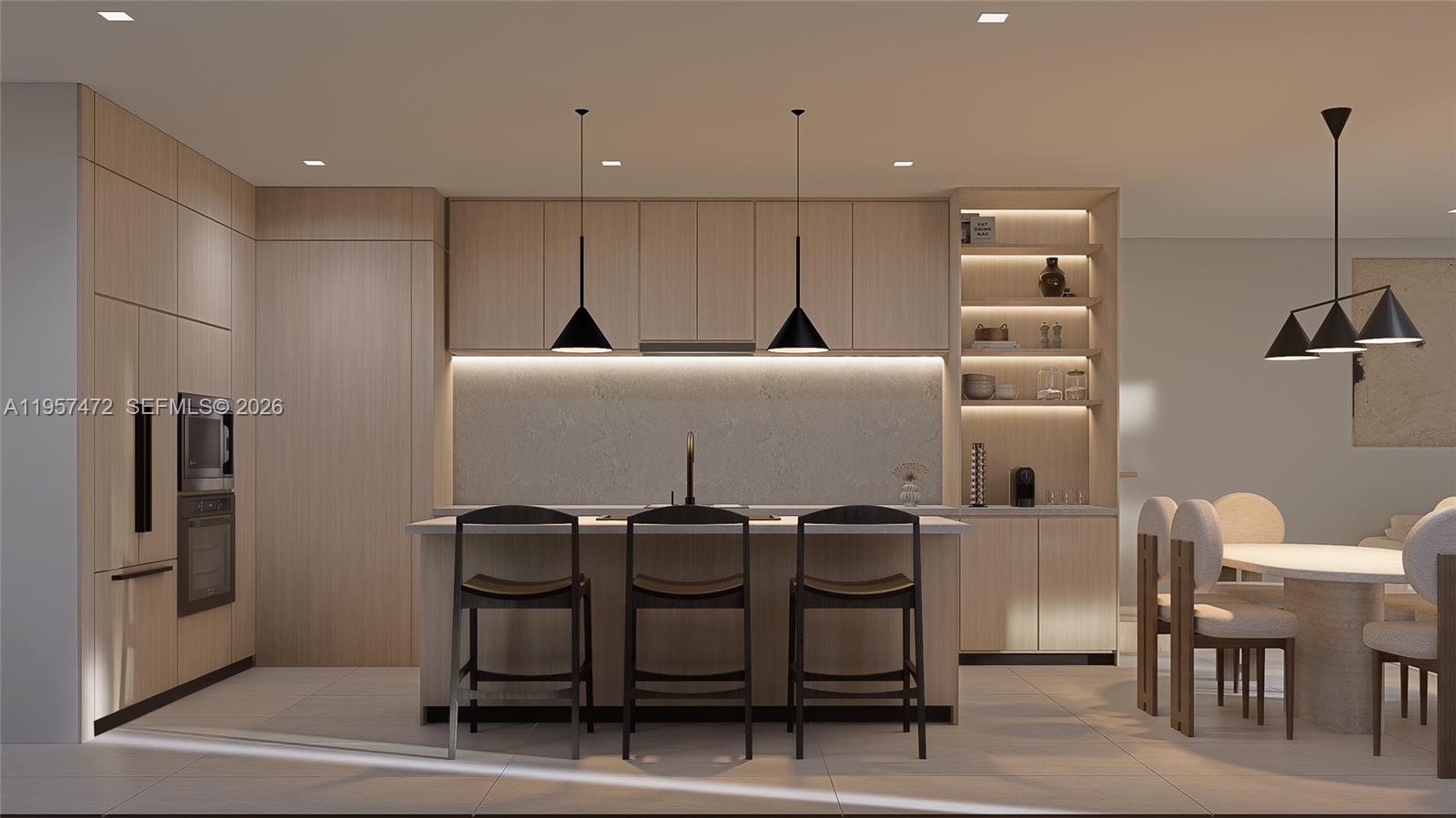 1017 Southwest 13th Court Miami, FL 33135 - Photo 3 of 8 a large kitchen with a table and chairs