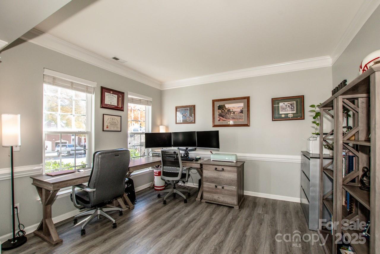 182 Harris Farm Road Mooresville, NC 28115 - Photo 13 of 44 a view of a workspace with furniture and a window