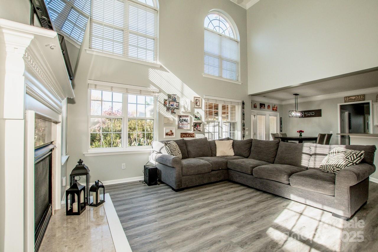 182 Harris Farm Road Mooresville, NC 28115 - Photo 17 of 44 a living room with furniture and a large window