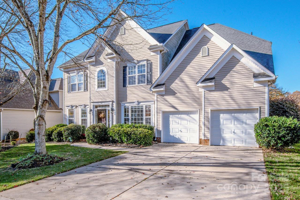 182 Harris Farm Road Mooresville, NC 28115 - Photo 2 of 44 a view of a white house next to a yard