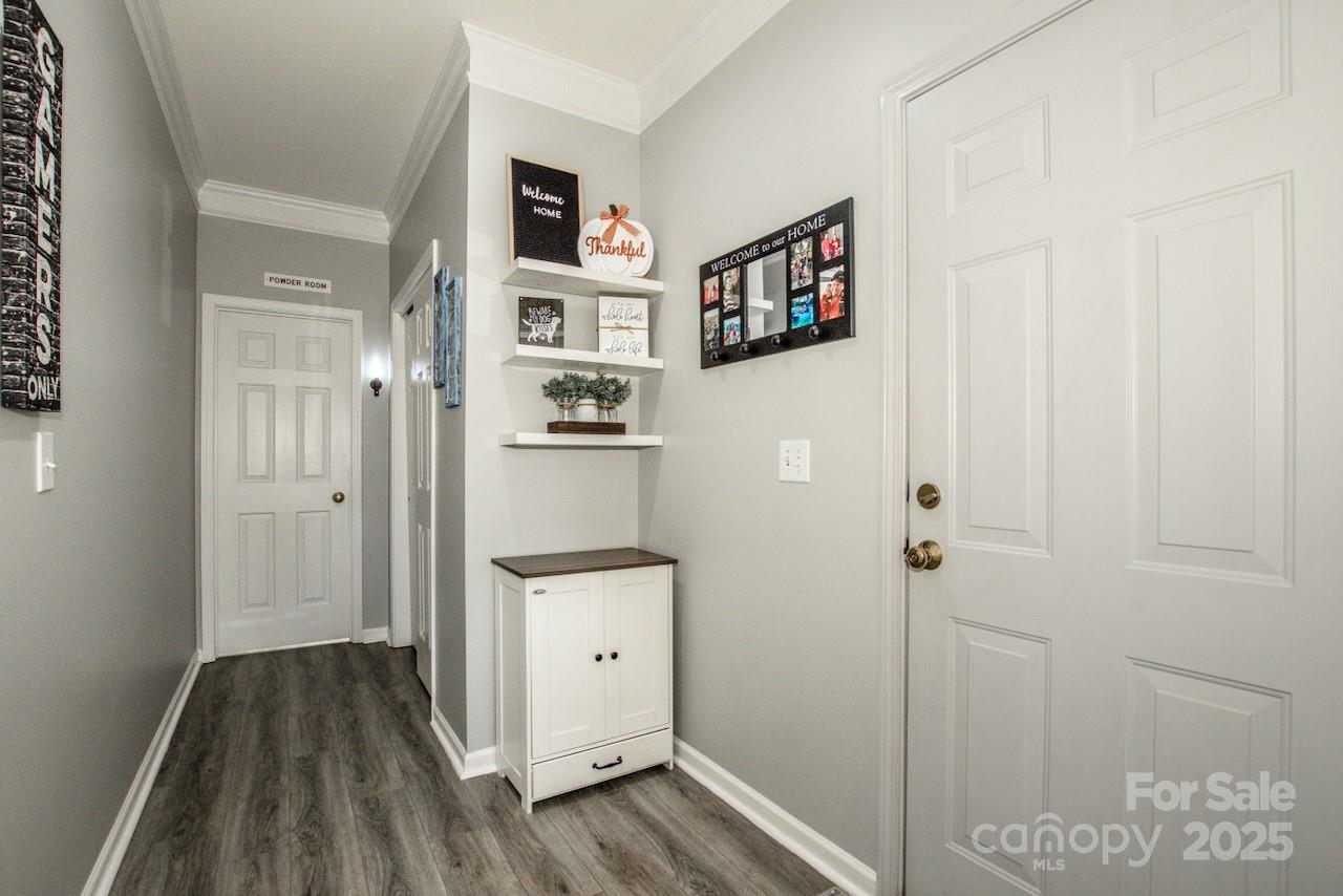 182 Harris Farm Road Mooresville, NC 28115 - Photo 23 of 44 a view of a hallway with bathroom and front door