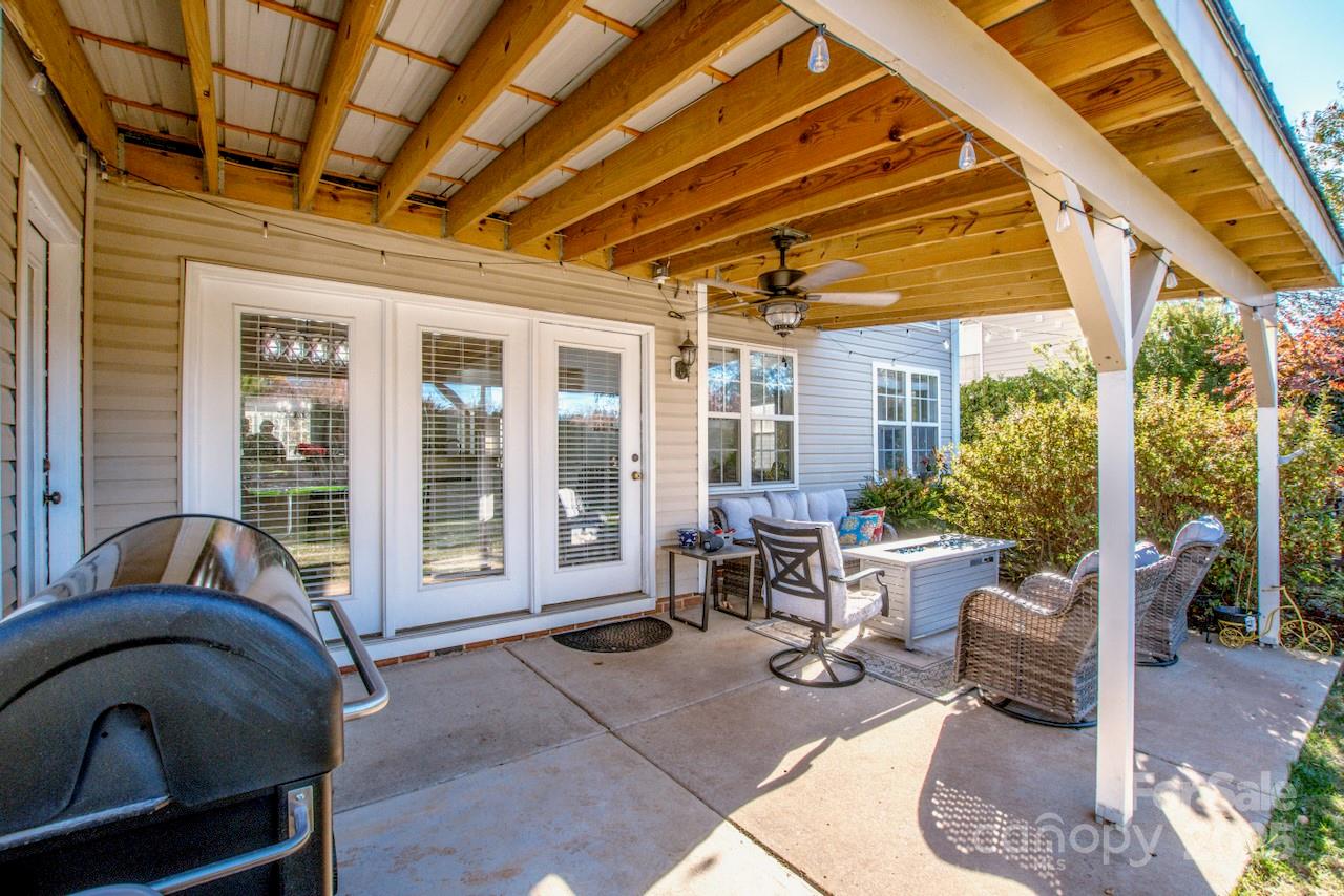 182 Harris Farm Road Mooresville, NC 28115 - Photo 6 of 44 a living room with furniture and a large window