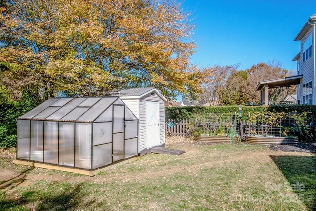 a view of a wrought iron fences in front of house