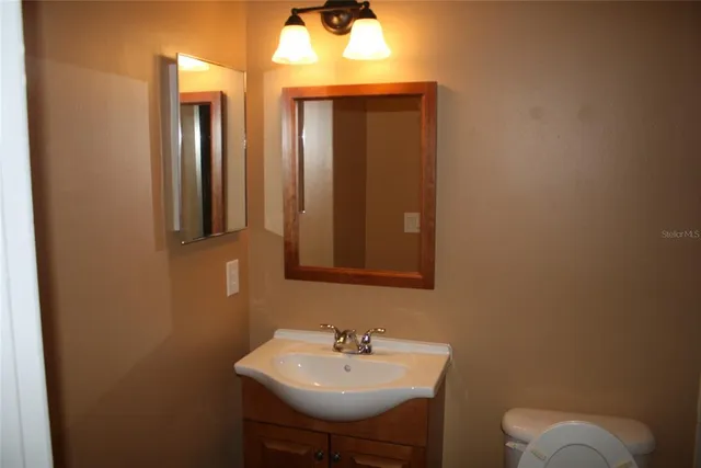 a bathroom with a toilet and a bathtub