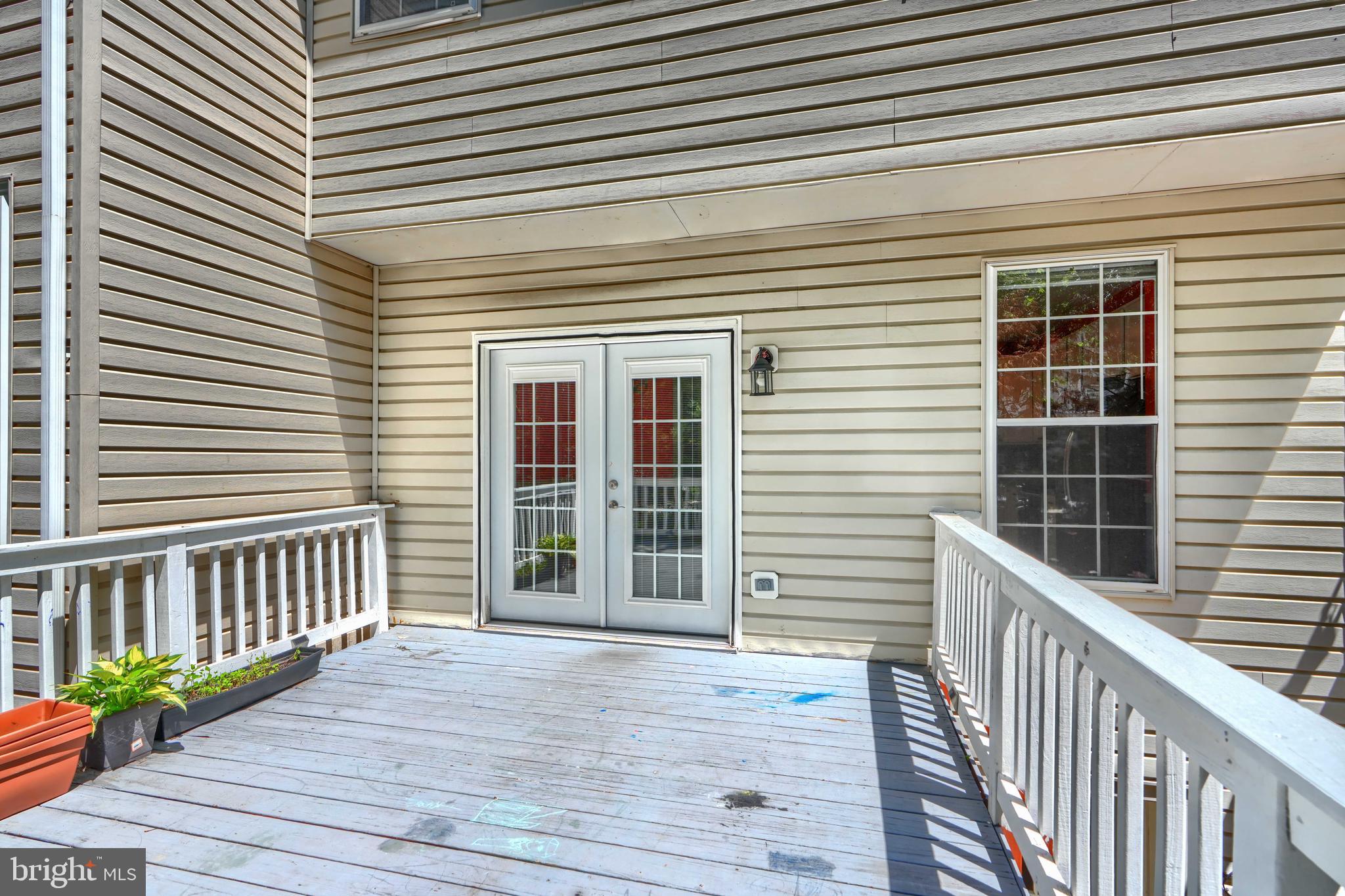 1713 Sea Pine Circle Severn, MD 21144 - Photo 13 of 33 a view of a house with a deck