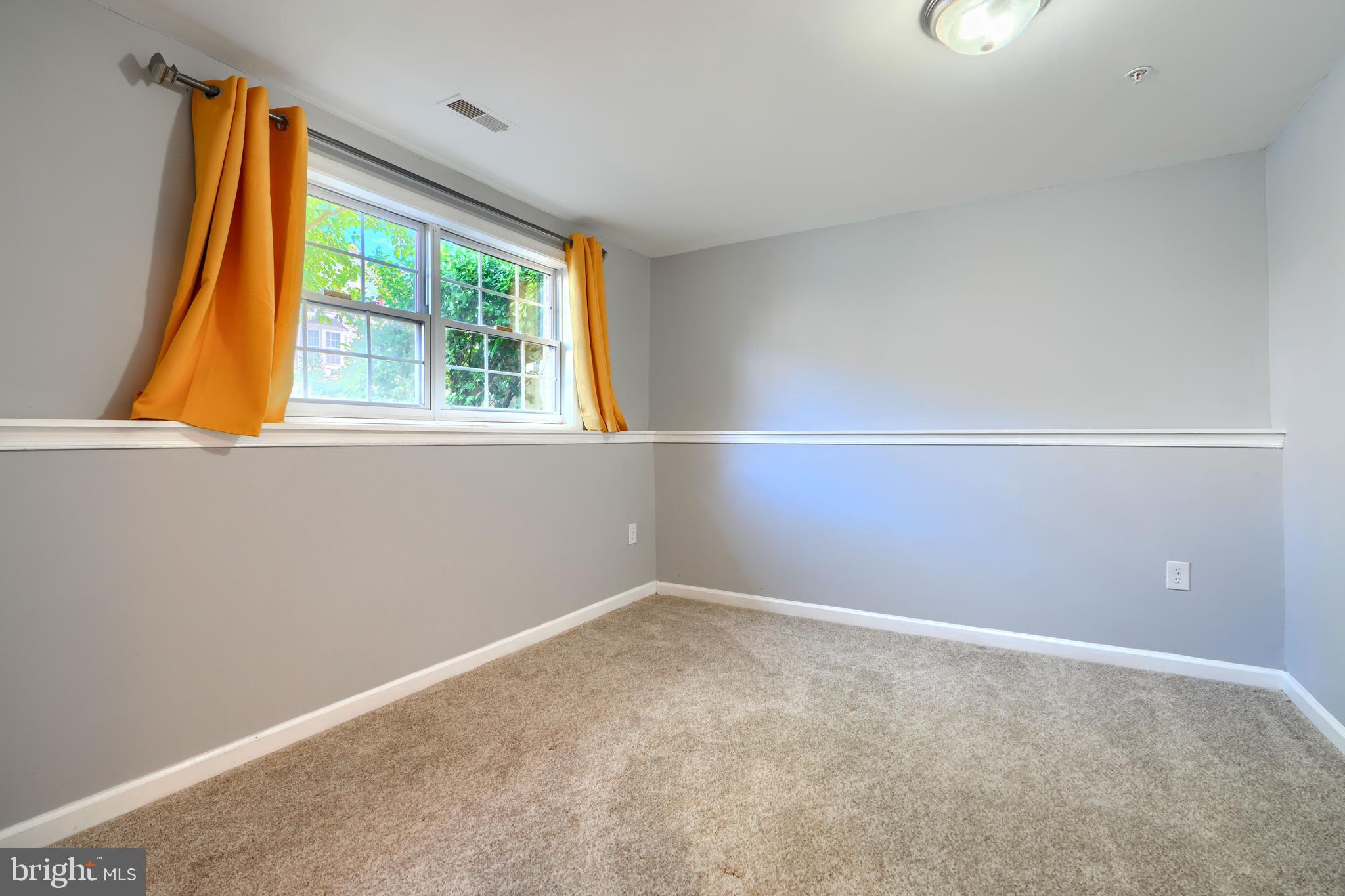 1713 Sea Pine Circle Severn, MD 21144 - Photo 27 of 33 an empty room with a window