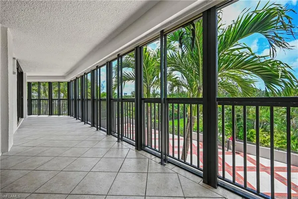a view of a room that has a large window