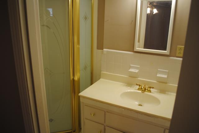 1357 A Academy Road Portland, TN 37148 - Photo 11 of 19 a bathroom with a sink and a mirror
