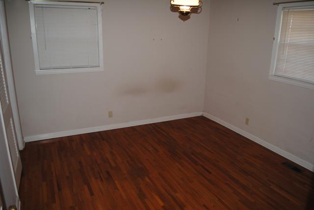 1357 A Academy Road Portland, TN 37148 - Photo 12 of 19 an empty room with wooden floor