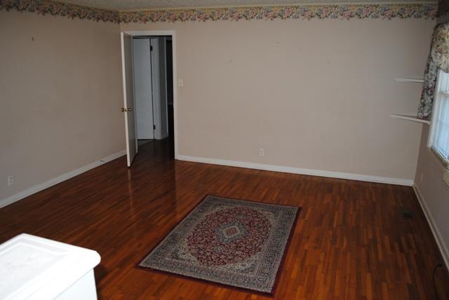 1357 A Academy Road Portland, TN 37148 - Photo 7 of 19 a view of a hallway with wooden floor