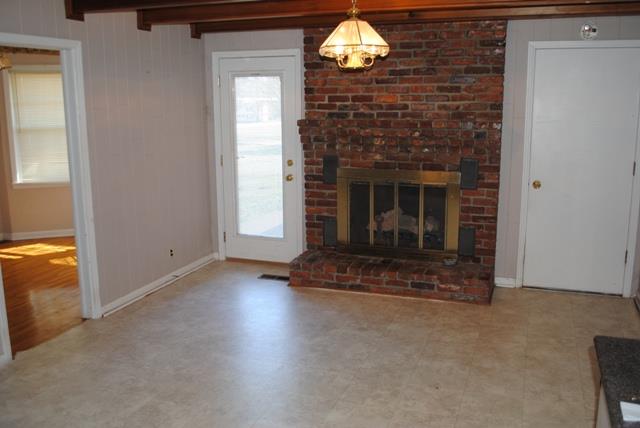 1357 A Academy Road Portland, TN 37148 - Photo 8 of 19 a view of fireplace and wooden floor