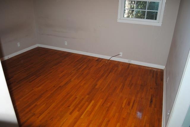 1357 A Academy Road Portland, TN 37148 - Photo 10 of 19 a view of room with window and hardwood floor