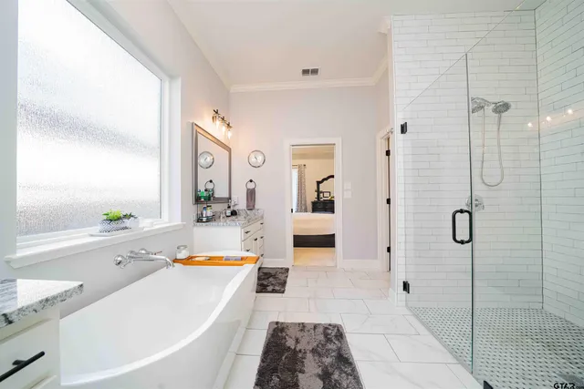 a bathroom with a shower and a toilet