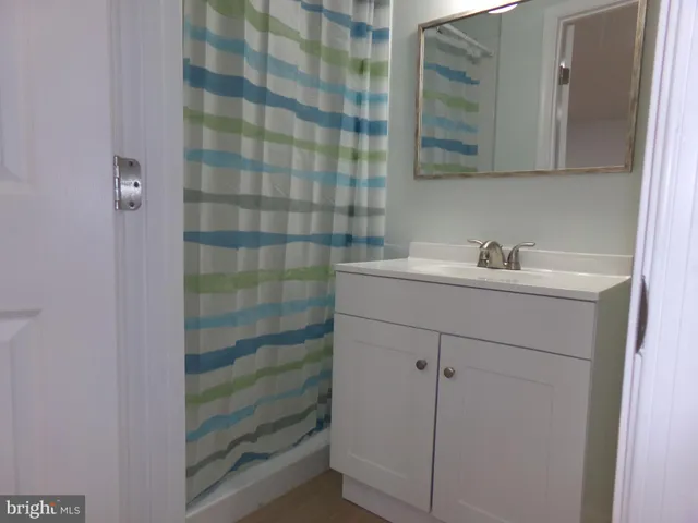 a view of a kitchen with a sink