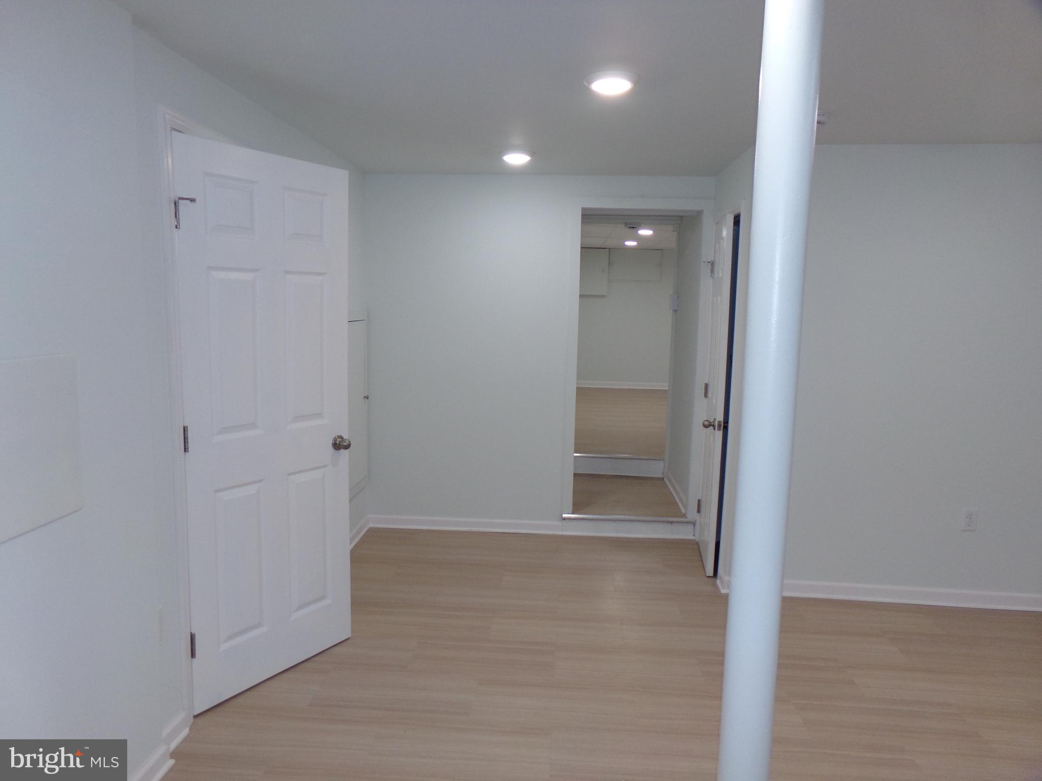 276 East Main Street, Unit 5 Westminster, MD 21157 - Photo 16 of 23 wooden floor in an empty room