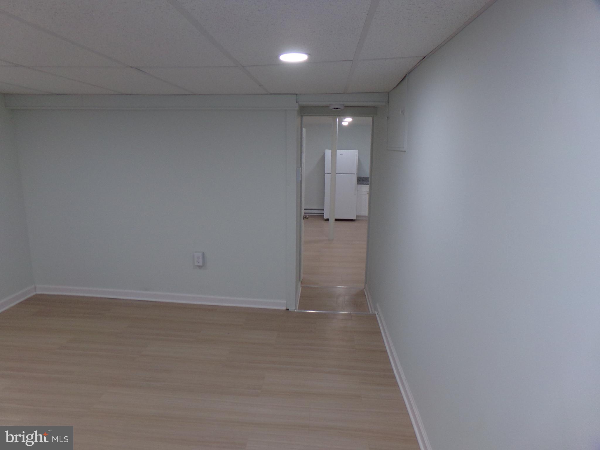 276 East Main Street, Unit 5 Westminster, MD 21157 - Photo 20 of 23 a view of hallway with wooden floor