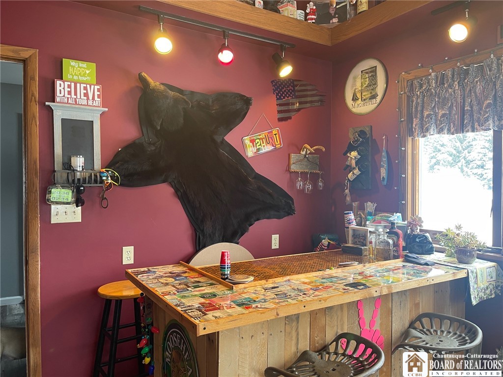 3833 Sherman Ripley Road Sherman, NY 14781 - Photo 12 of 48 Bar room with ceiling fan, large windows and just