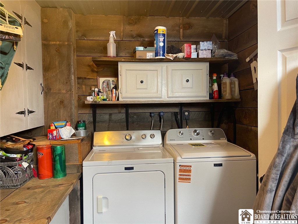 3833 Sherman Ripley Road Sherman, NY 14781 - Photo 21 of 48 Laundry area with storage cabinets and shelving
