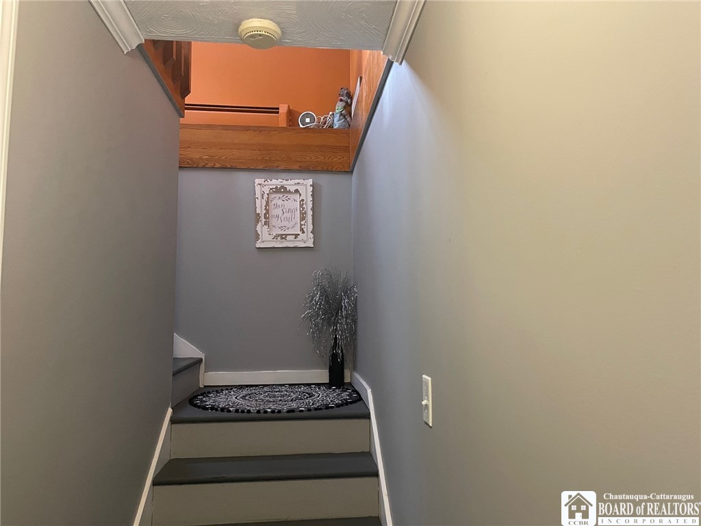 3833 Sherman Ripley Road Sherman, NY 14781 - Photo 27 of 48 Stairs to the second floor with 90 degree turn