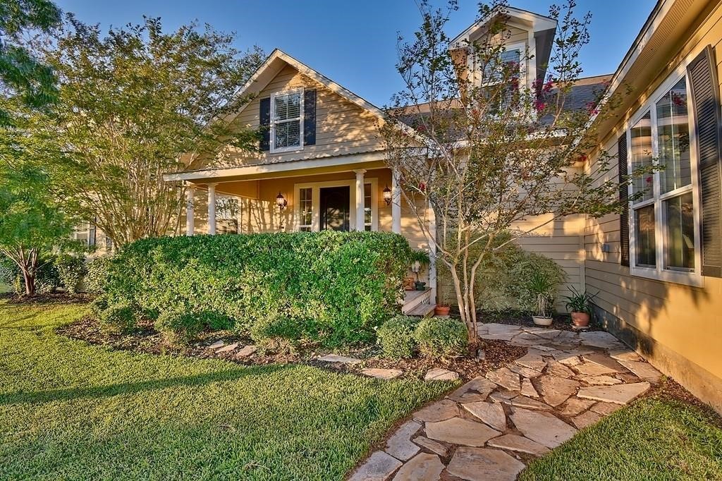 8456 Schuster Road Ledbetter, TX 78946 - Photo 5 of 49 a front view of a house with a yard