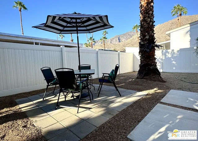 a house with outdoor seating space