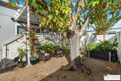 a view of a house with a street