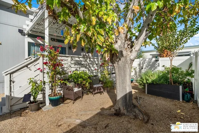 a view of a house with a street