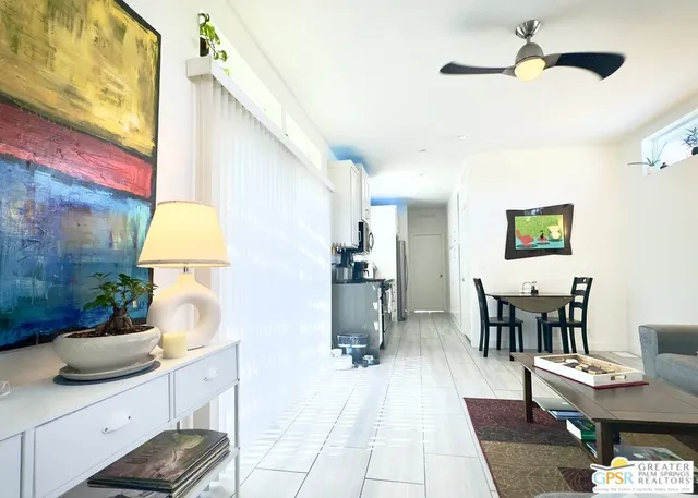 a kitchen with stainless steel appliances granite countertop a stove a refrigerator and a microwave