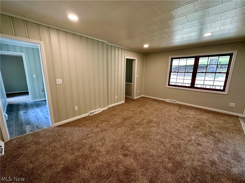48963 Bloomfield Road East Liverpool, OH 43920 - Photo 10 of 25 Empty room featuring dark colored carpet
