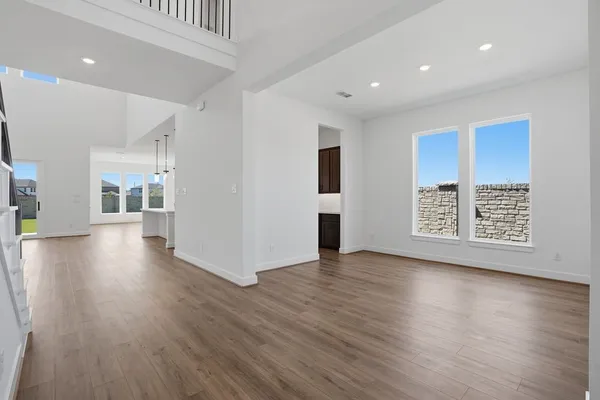 an aerial view of residential house with outdoor space and swimming pool