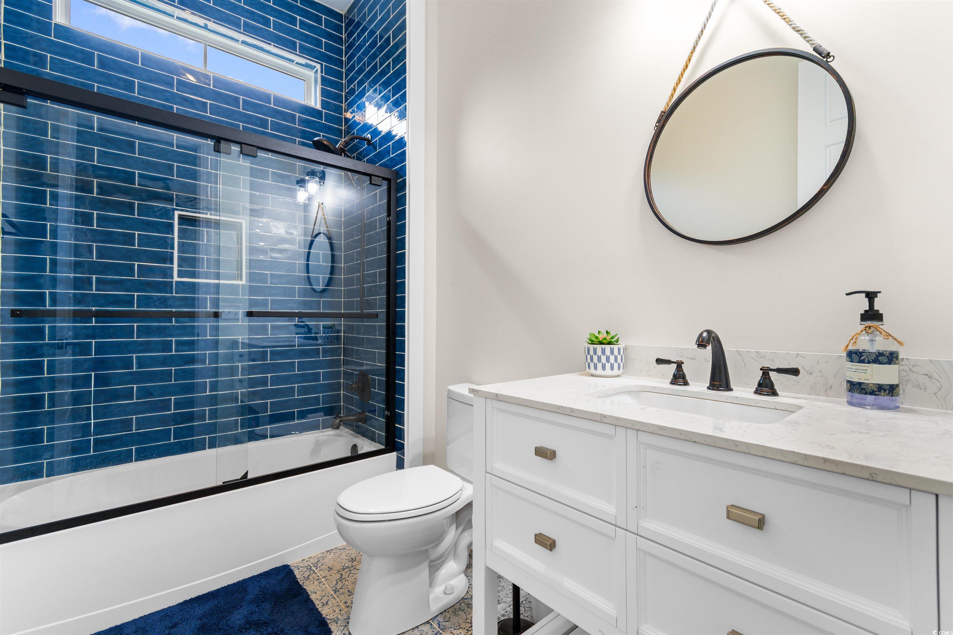 4785 Valley Forge Road Aynor, SC 29511 - Photo 20 of 40 Full bathroom with vanity, toilet, and enclosed tu