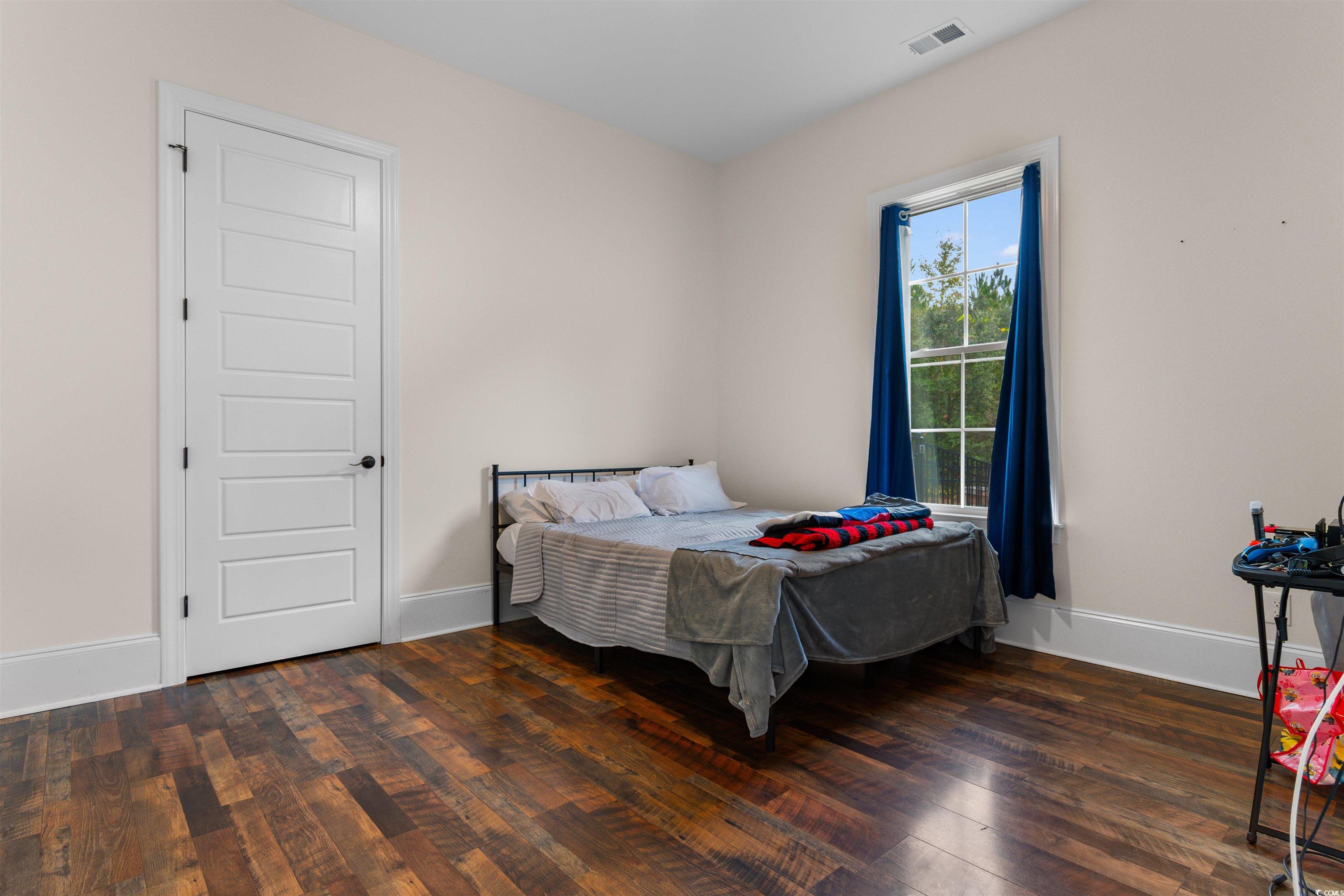 4785 Valley Forge Road Aynor, SC 29511 - Photo 21 of 40 Bedroom featuring dark wood-type flooring