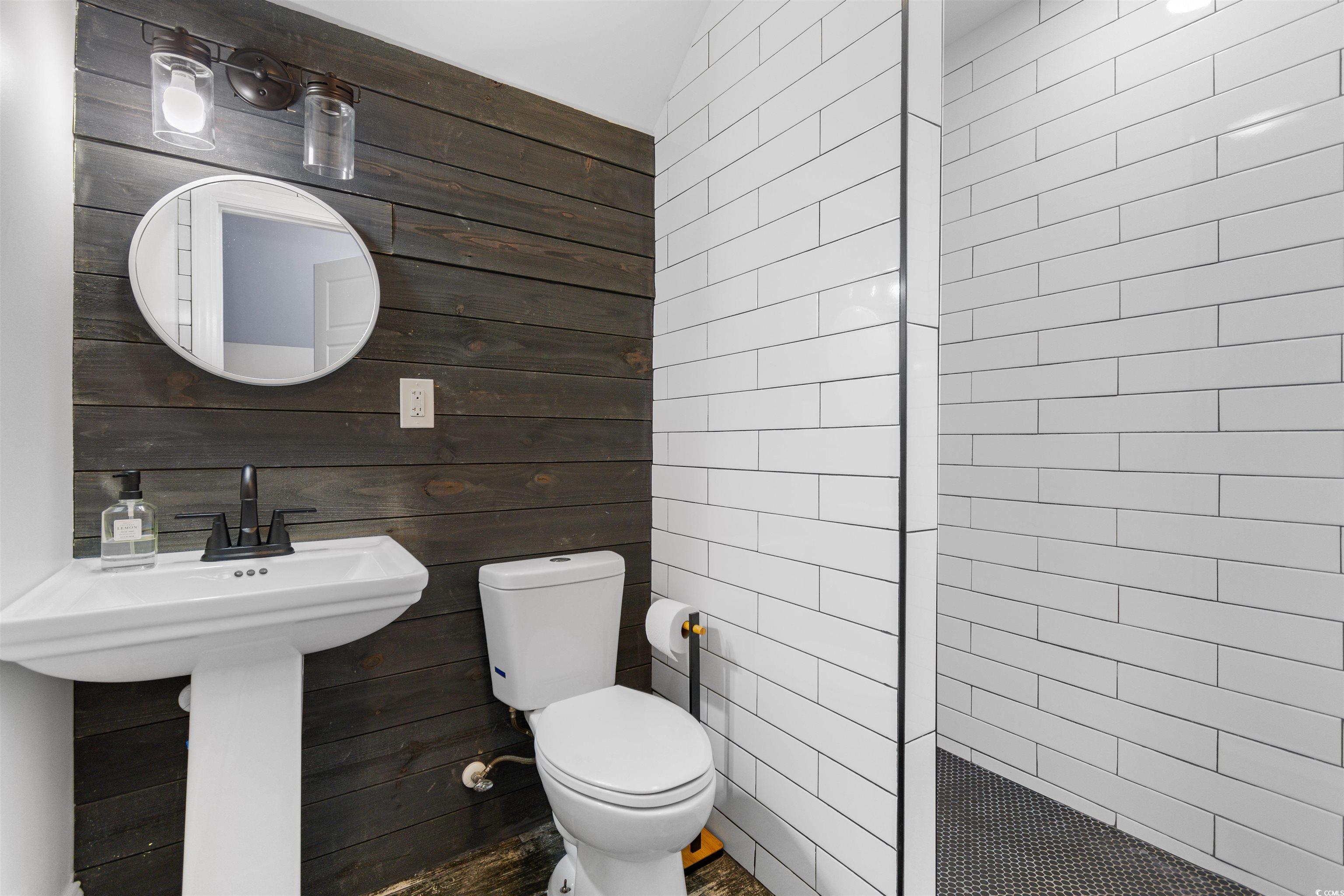 4785 Valley Forge Road Aynor, SC 29511 - Photo 28 of 40 Bathroom with toilet and wooden walls