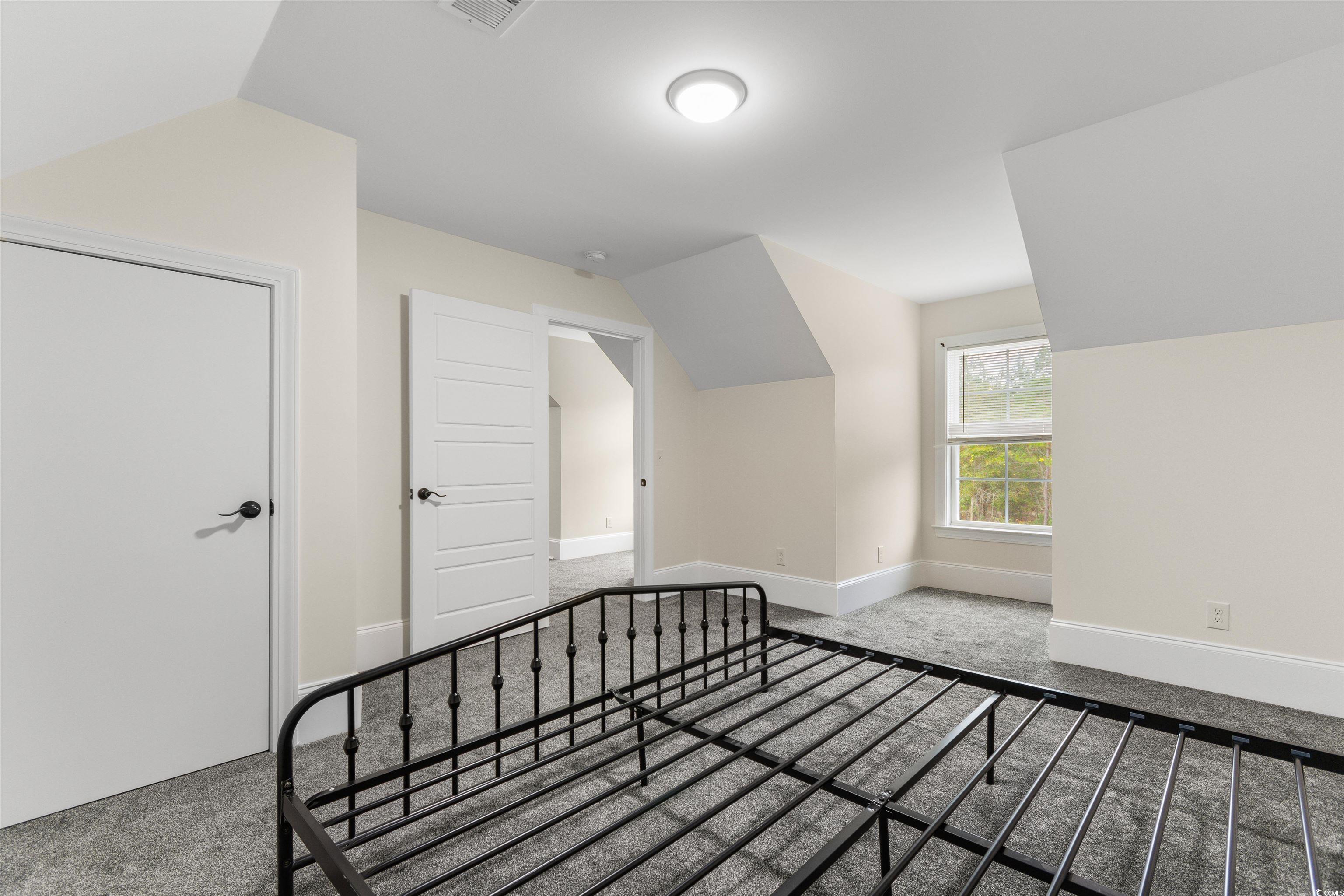 4785 Valley Forge Road Aynor, SC 29511 - Photo 30 of 40 Bedroom featuring carpet floors and lofted ceiling