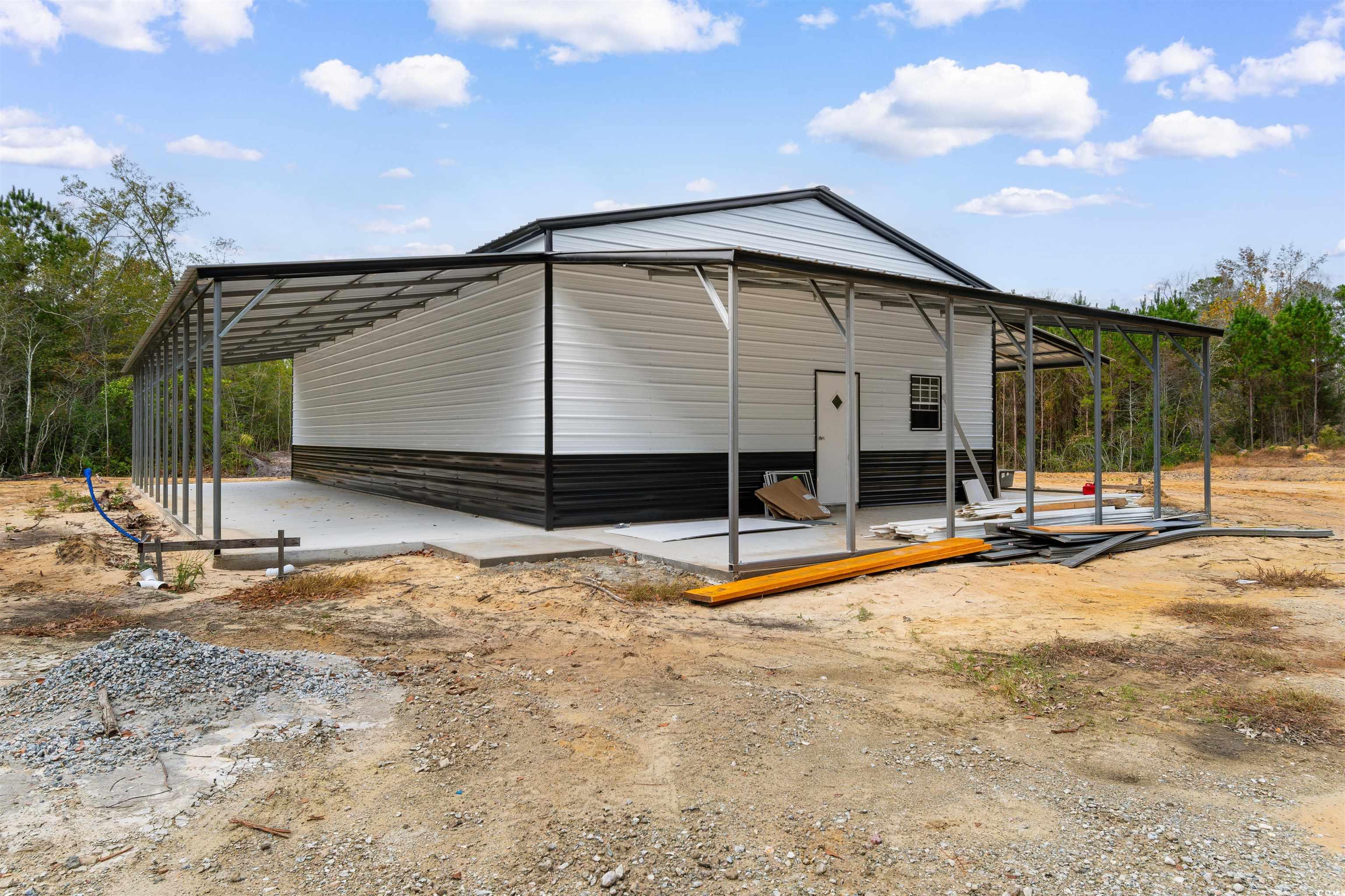 4785 Valley Forge Road Aynor, SC 29511 - Photo 31 of 40 Exterior space featuring a carport