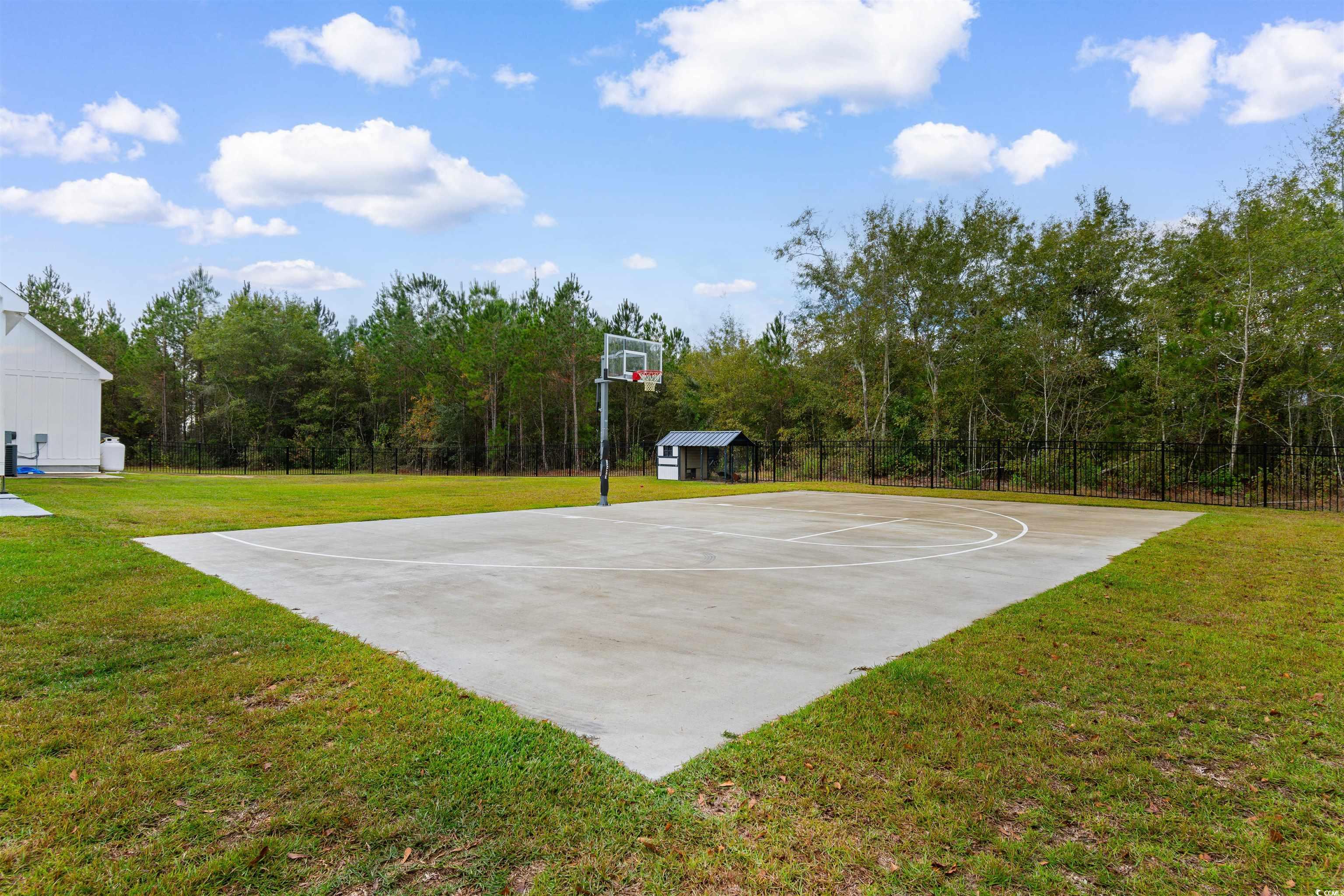 4785 Valley Forge Road Aynor, SC 29511 - Photo 33 of 40 View of sport court featuring a lawn