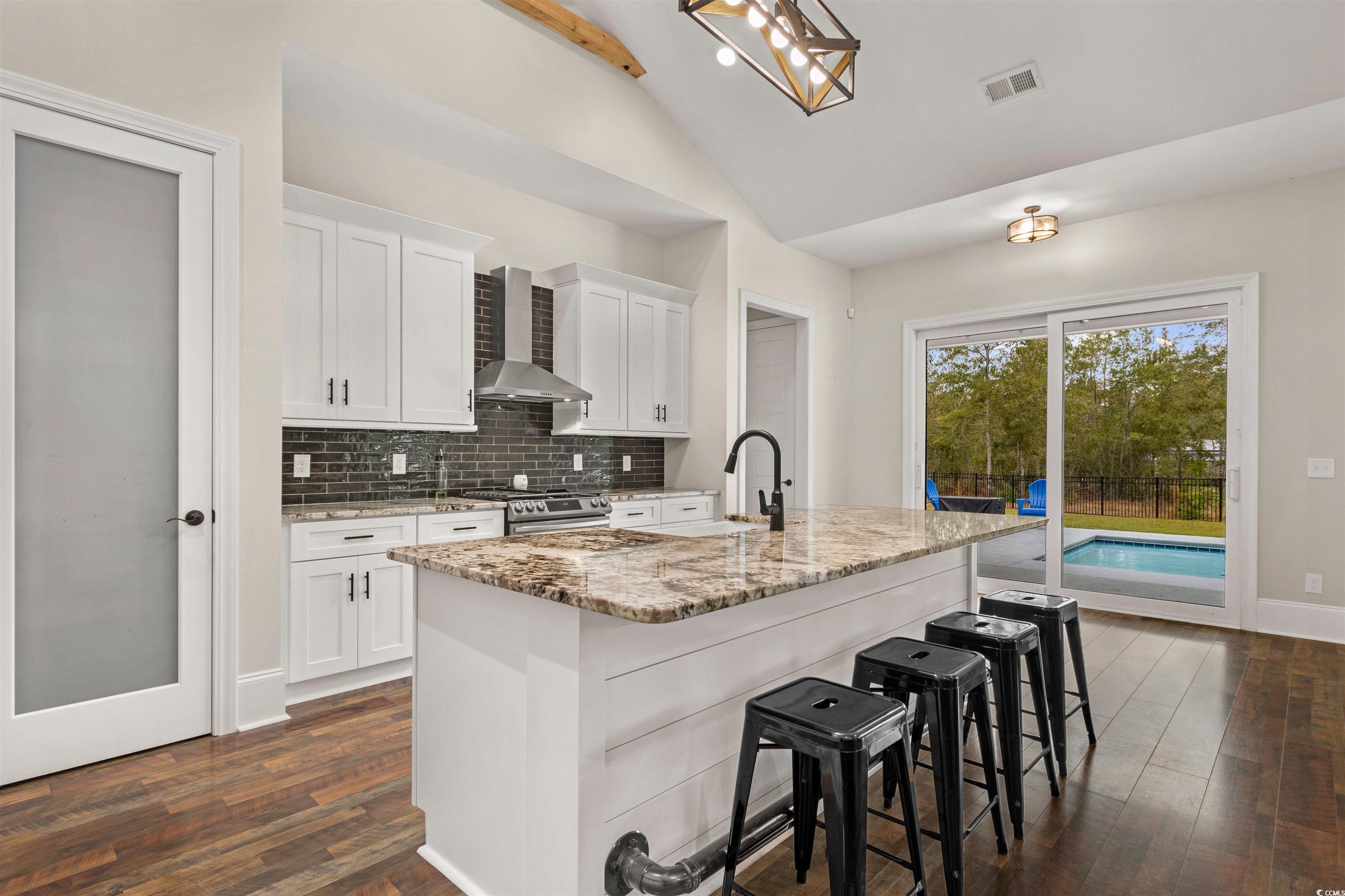 4785 Valley Forge Road Aynor, SC 29511 - Photo 9 of 40 Kitchen with lofted ceiling, wall chimney exhaust