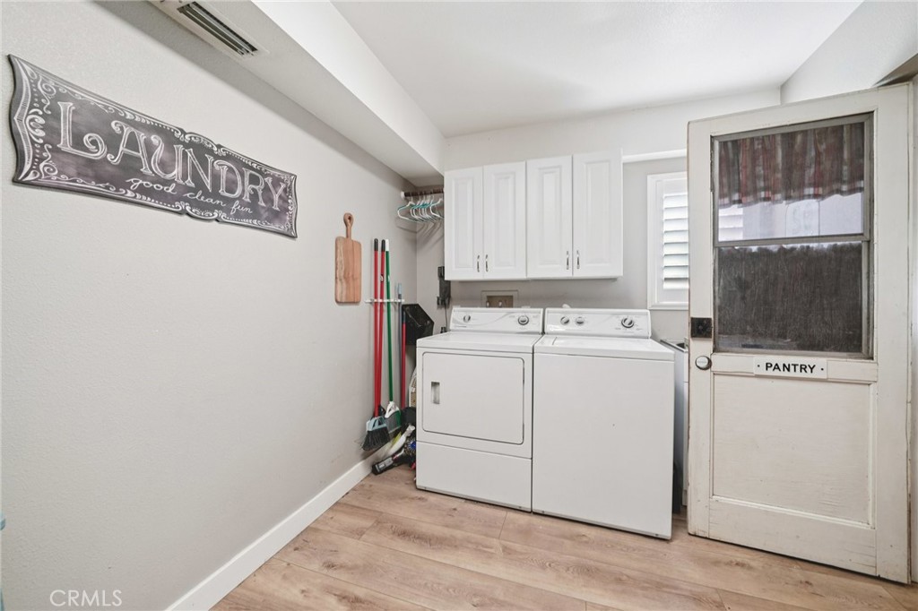 2821 Riding Ring Road Norco, CA 92860 - Photo 15 of 54 a utility room with dryer and washer