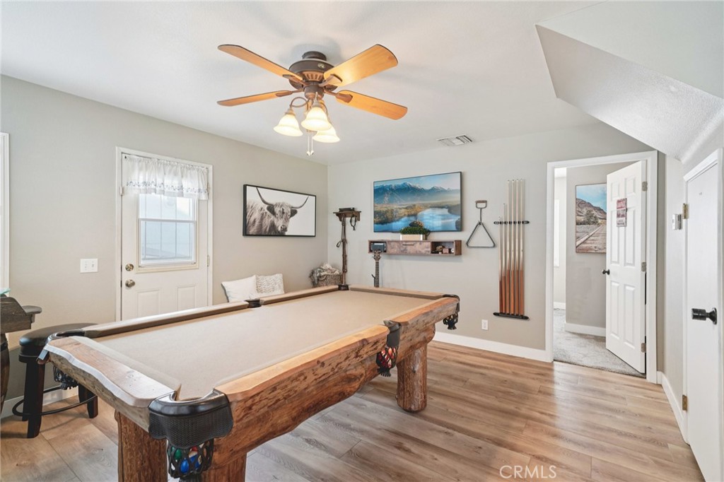 2821 Riding Ring Road Norco, CA 92860 - Photo 17 of 54 a room with furniture and wooden floor