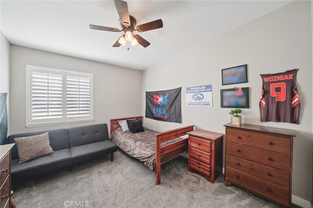2821 Riding Ring Road Norco, CA 92860 - Photo 21 of 54 a living room with furniture and a window