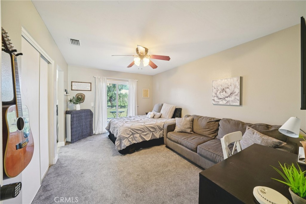 2821 Riding Ring Road Norco, CA 92860 - Photo 23 of 54 a living room with furniture and a window