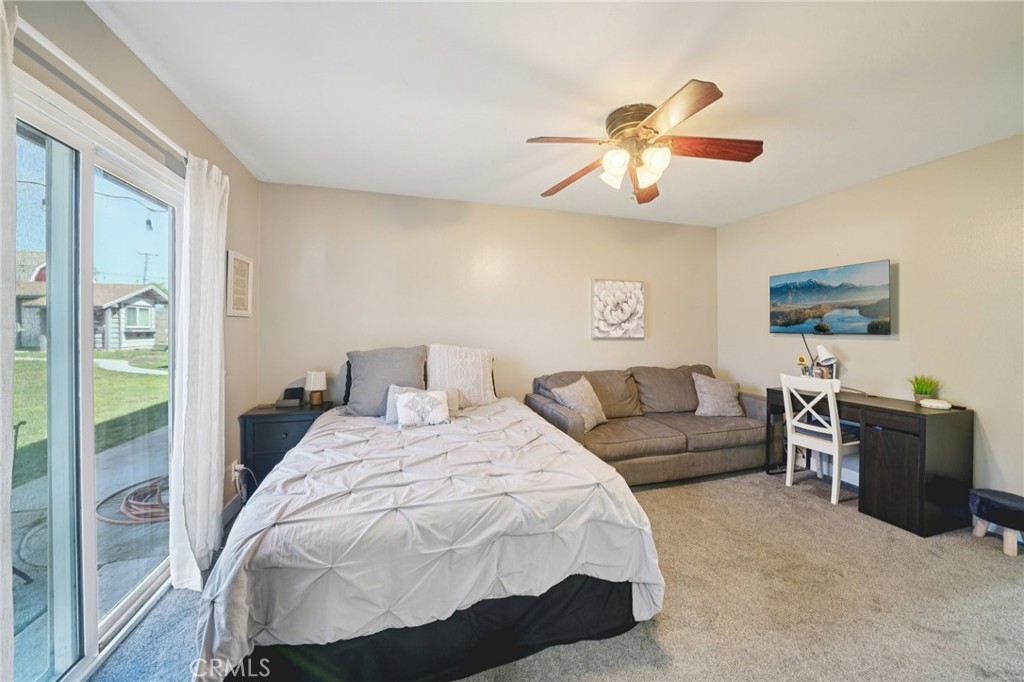 2821 Riding Ring Road Norco, CA 92860 - Photo 24 of 54 a bedroom with a bed and ceiling fan
