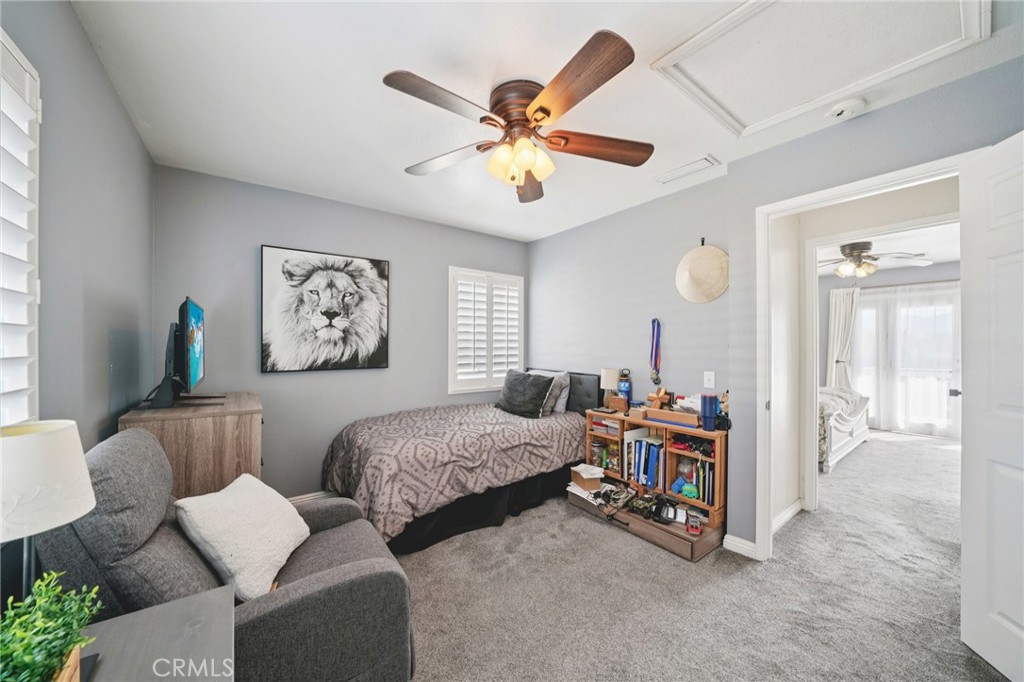 2821 Riding Ring Road Norco, CA 92860 - Photo 29 of 54 a view of a livingroom with furniture and a chandelier fan